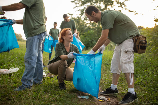 istock Dedicated environmental volunteers, cleaning nature together 1265548803