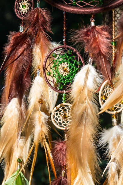 istock Handmade dream catcher with feathers threads and beads rope hanging 1265548821