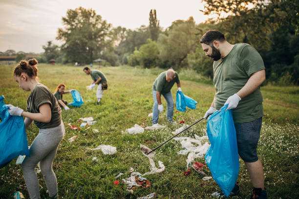 istock Volunteers collecting garbage from the park 1265548858