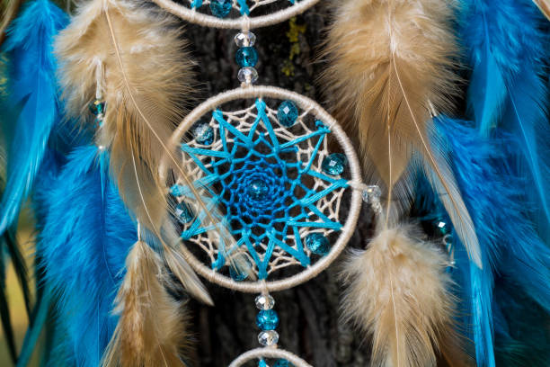 istock Handmade dream catcher with feathers threads and beads rope hanging 1265548984