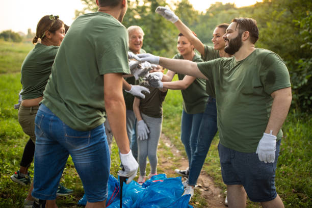 istock Unity of environmental volunteers at public park 1265549209