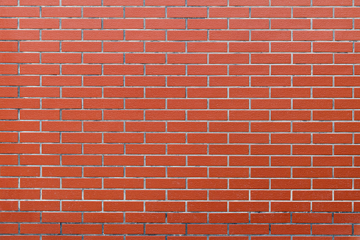 Red brick wall texture background.