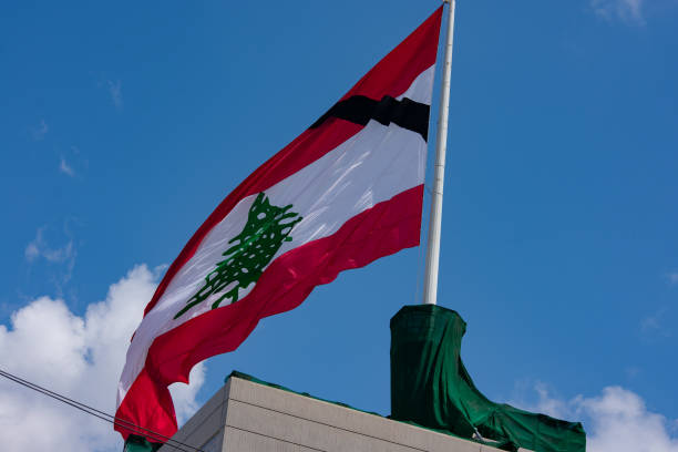 istock Lebanese flag on a rooftop 1265553532