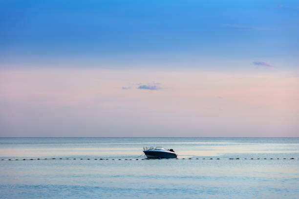 istock motor boat anchored in the ocean 1265555033