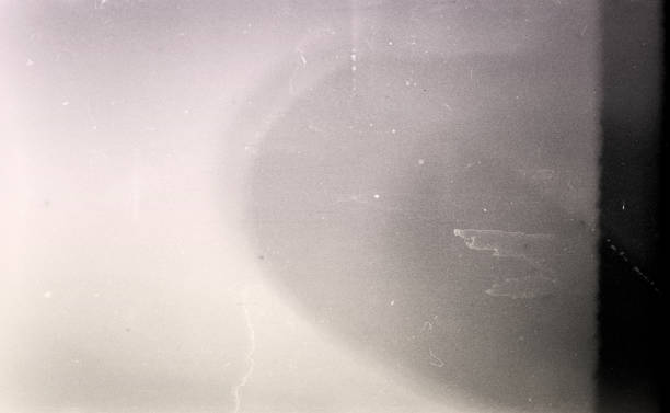 istock Noisy film frame with heavy noise, dust and grain 1265562244