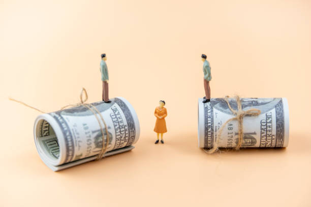 istock Dollars and business people 1265562251