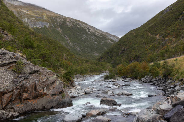 istock Rocky white river mountains valley scandinavia Norway 1265563847