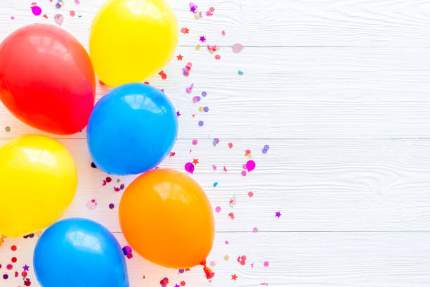 istock Party concept with colorful balloons on white background top view copy space 1265570788