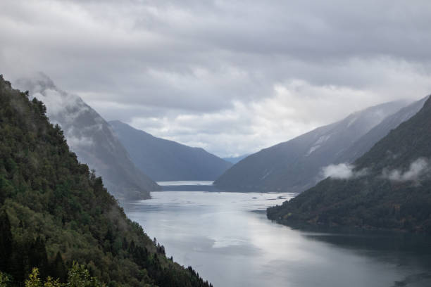 istock Grey colors Norway fjord cloudy landscape 1265579267