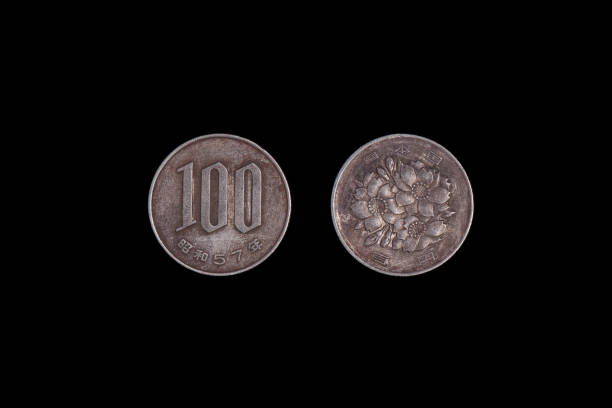 istock Japan coin 100 yen, black background. close-up, obverse and reverse 1265579588