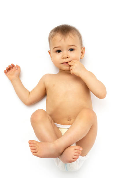 istock Cute little baby in diaper on white background 1265580939