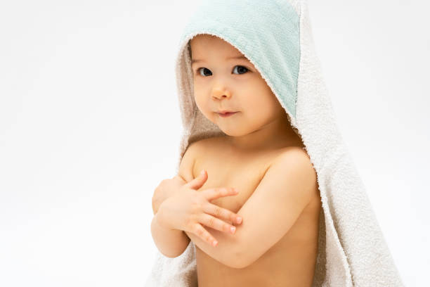 istock Cute baby with a hooded towel after a bathing 1265582297