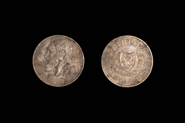 istock old coin twenty cent Cyprus 1991, black background close-up 1265582439