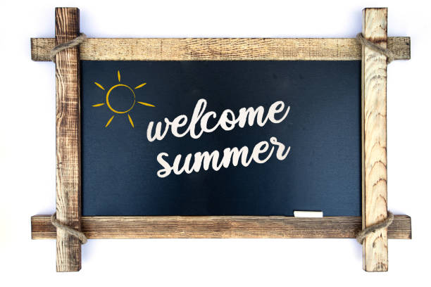 Welcome summer written on black chalkboard. School holiday concept. Welcome summer written on black chalkboard. School holiday concept. Horizontal composition with copy space. first day of school stock pictures, royalty-free photos & images