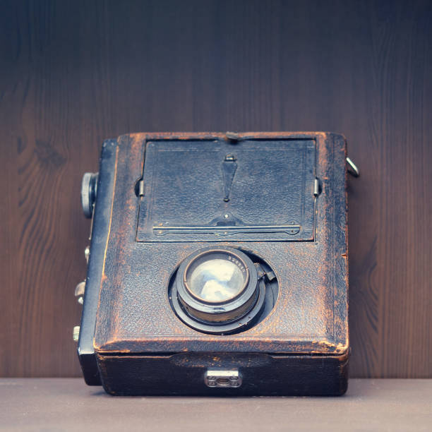 istock Old camera is on a shelf in a retro closet 1265590591