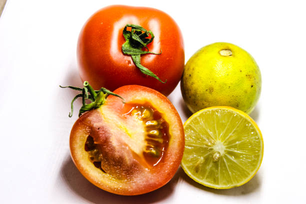 A picture of fresh tomato with lemons