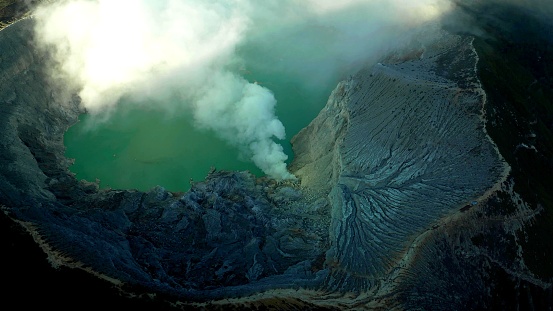 A top view inside a volcano which is erupting in the Java island in Indonesia