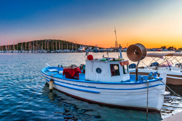 istock Old fishing boat in the harbor. 1265598209