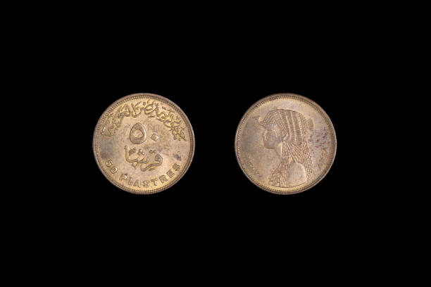 istock Egypt coin 50 piastres. Black background, close-up on both sides. 1265599662