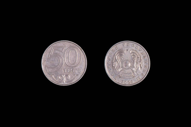istock 50 tenge Kazakhstan 2000 year. Isolated object on a black background. Close-up on both sides 1265601129