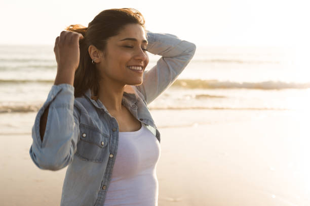 istock Woman at the beach 1265602848