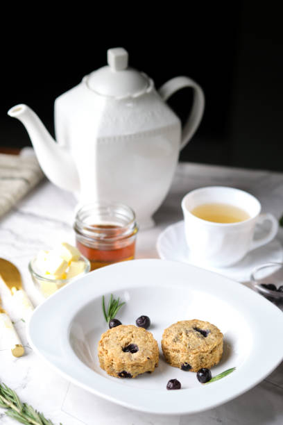 istock Blueberry scones. a Traditional British baked good for tea time. set on cafe table. 1265602939