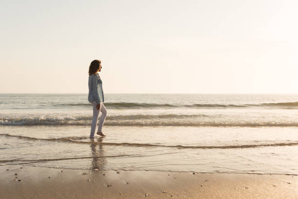 istock Woman at the beach 1265602989