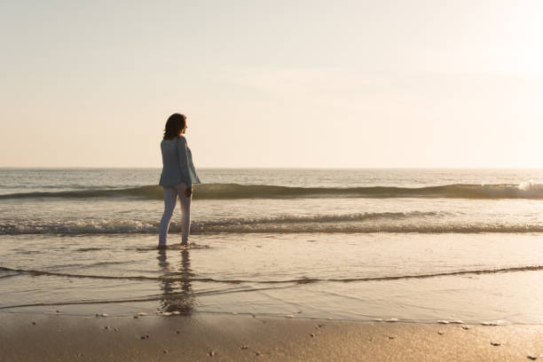 istock Woman at the beach 1265602994