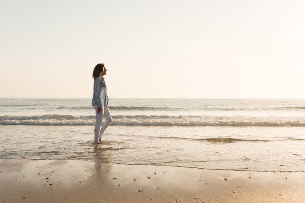 istock Woman at the beach 1265603002
