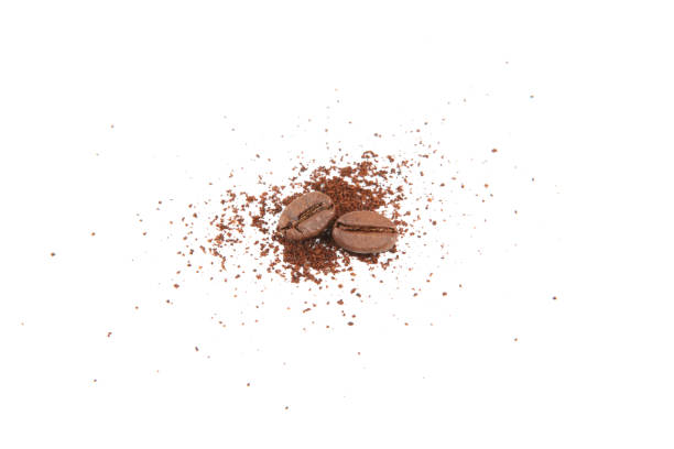 istock coffee beans and freshly ground coffee isolated on white 1265603033