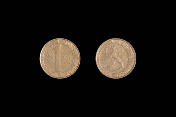 istock Old Finnish one markka coin. Black backgroung. 1265603103