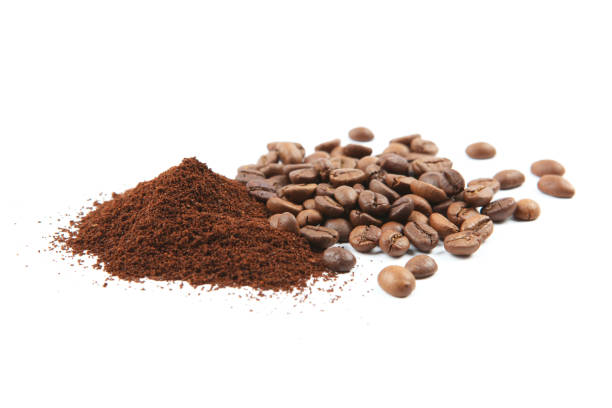 istock coffee beans and freshly ground coffee isolated on white 1265604811