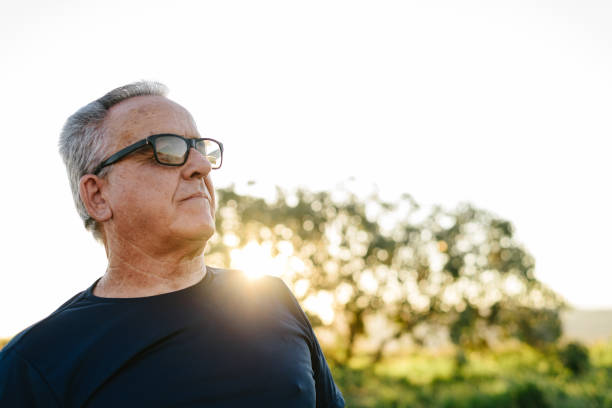 istock Senior man wearing glasses outdoors 1265606430