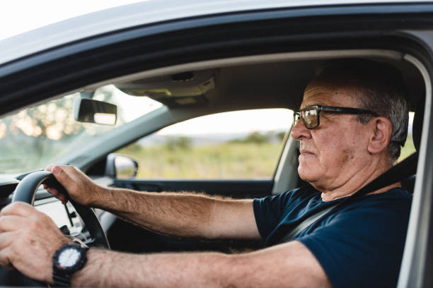 istock Senior man driving at countryside 1265608008