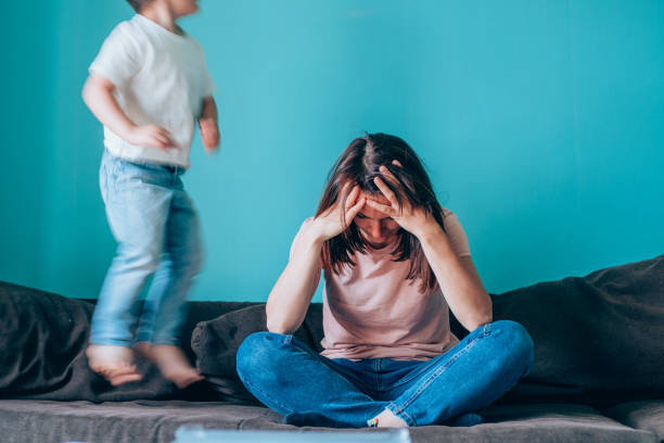 istock Stressed mother having problem with noisy naughty son. 1265609419