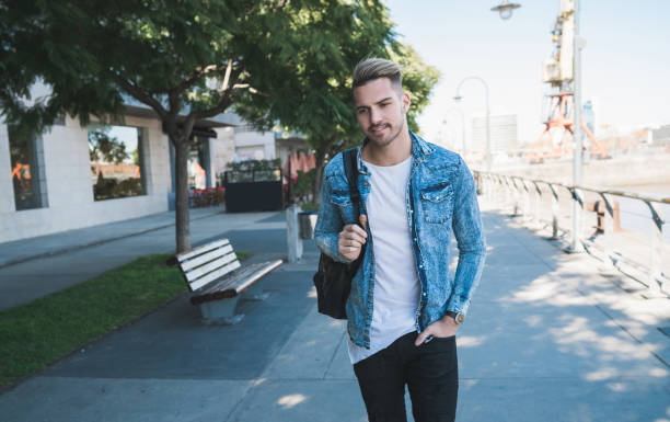 istock Man walking on the street. 1265610492
