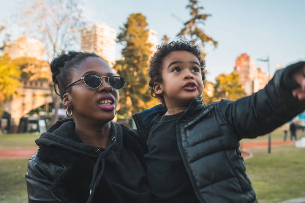 istock African american mother with his son. 1265610519