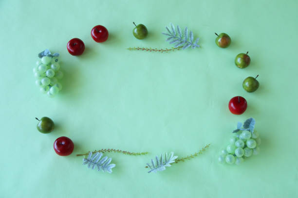 istock frame of grapes and apples 1265612023