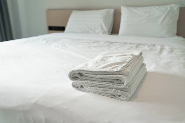 istock towels put on the white in the modern hotel 1265612582
