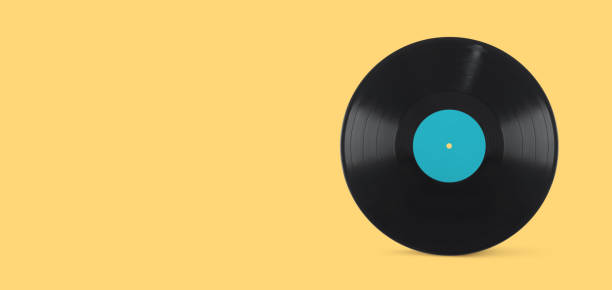 istock lp vinyl record with blank label isolated on yellow background 1265613544