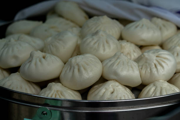 istock Xiao Long Bao steamed bun in bamboo basket. 1265613854