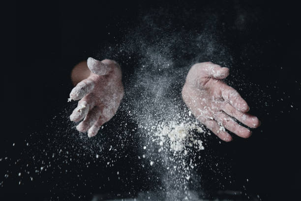 istock Kneading Loaf of Bread with Hands 1265630498