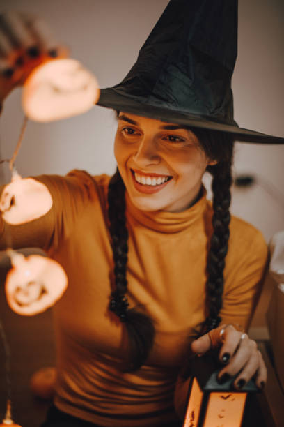 istock Young woman preparing decoration for Halloween 1265635003