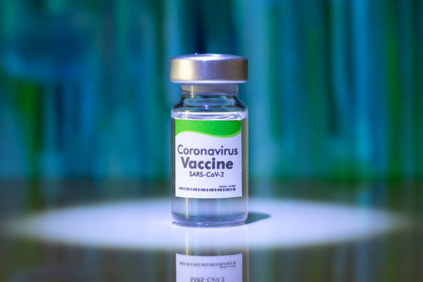 istock New Coronavirus Sars-Cov-2 Vaccine on the Laboratory Table - Green Label 1265635688