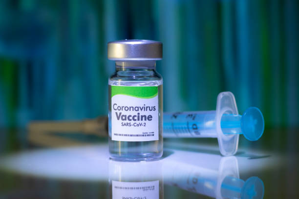 istock New Coronavirus Sars-Cov-2 Vaccine on the Laboratory Table - Green Label 1265635871