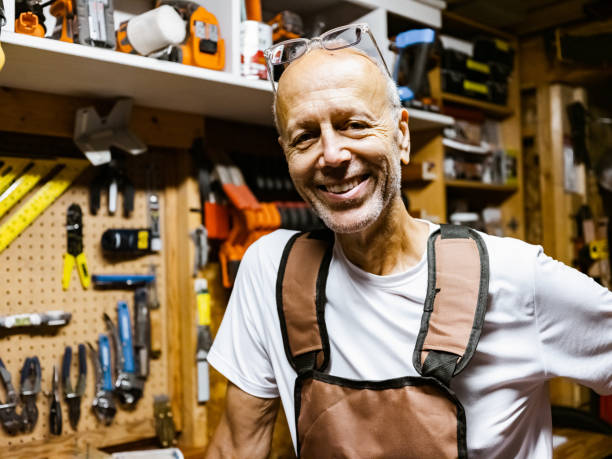 istock Senior hobby carpenter-man in his shop 1265642138
