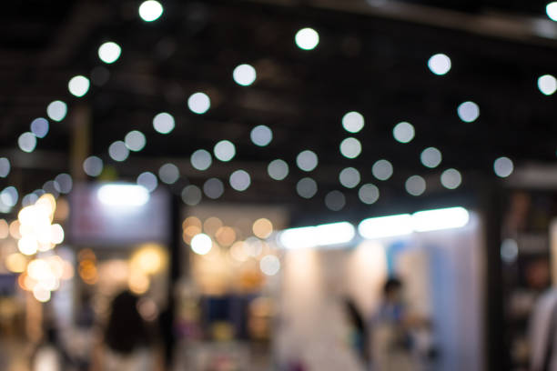 istock Abstract people walking in exhibition blurred background 1265642508