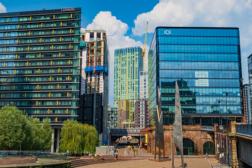 Manchester, United Kingdom - 12 August, 2020 : City centre of Manchester. People walk in Manchester district.