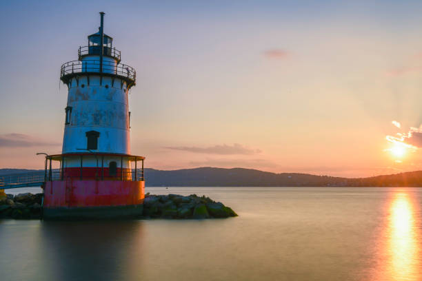 istock Sunset over Sleepy Hollow Lighthouse 1265649536