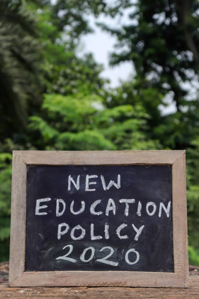 istock New Education Policy 2020 Written On Chalkboard with White Chalk  in Vertical Orientation 1265649884